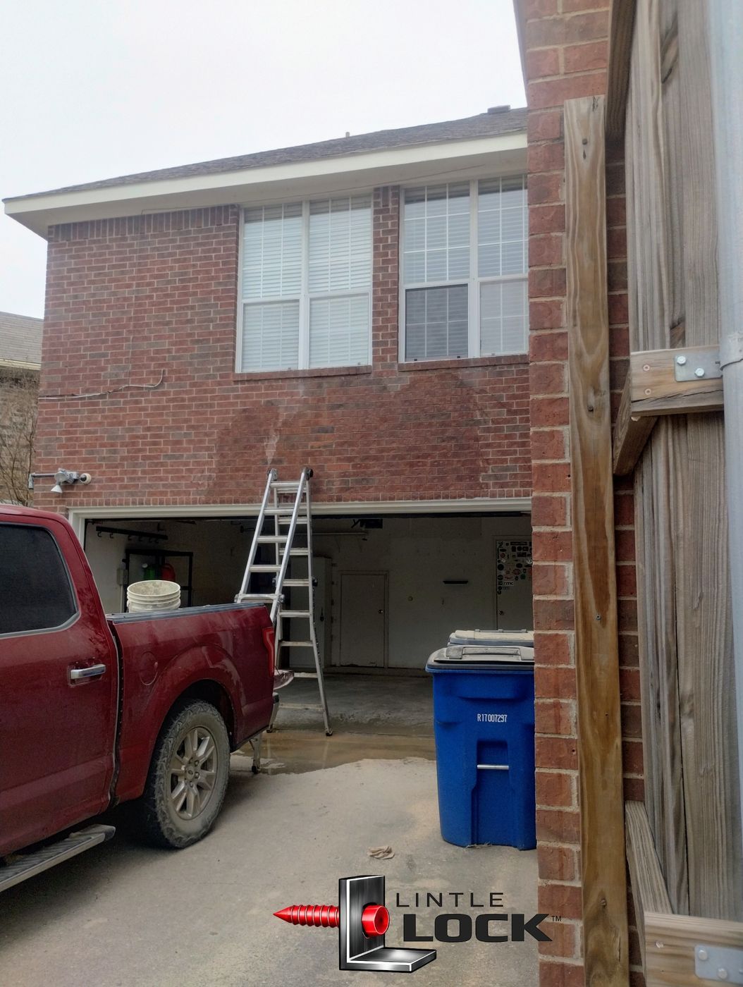Garage lintel showing sagging brick above the garage door (Dallas project photo)