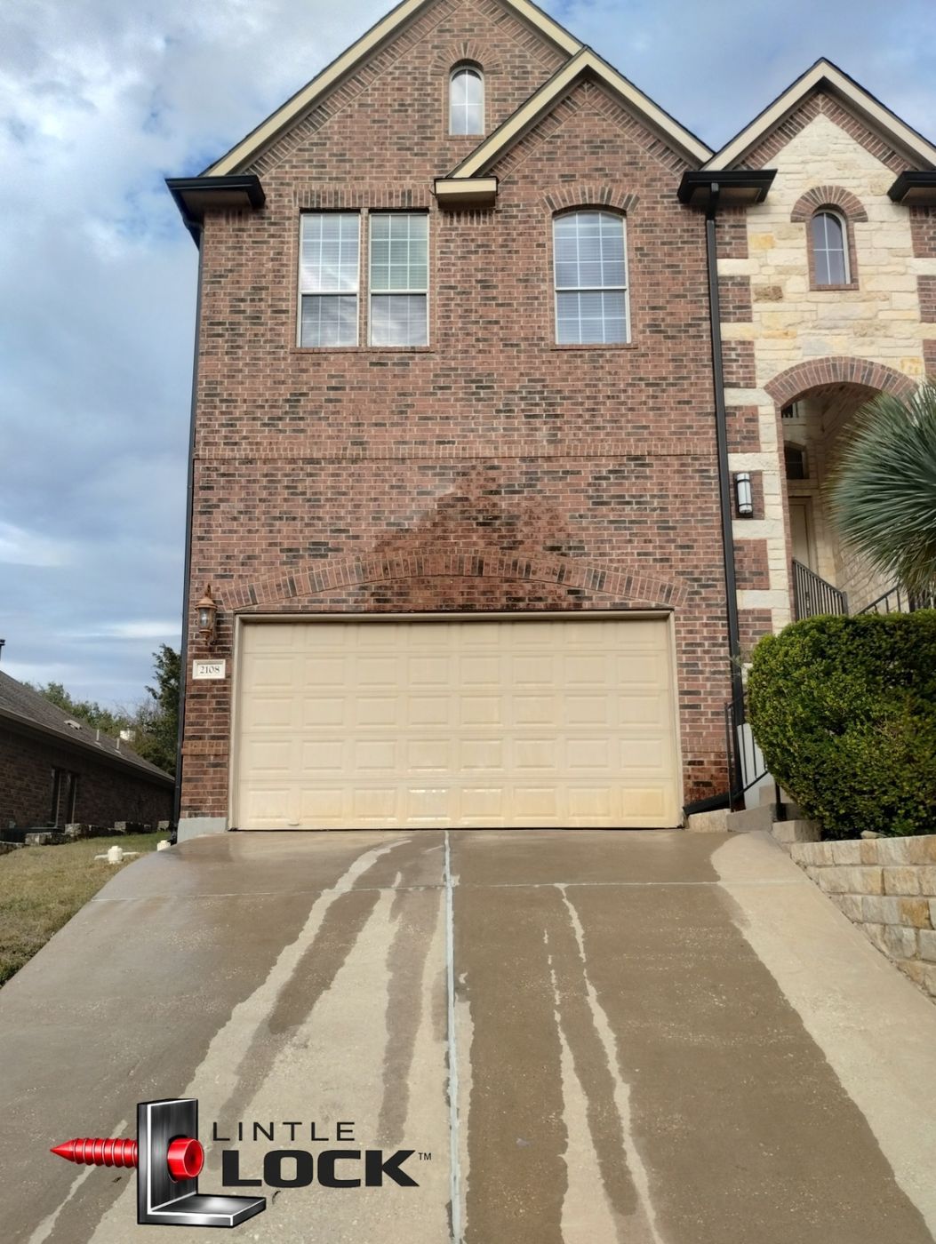 Brick home with LintleLOCK-repaired garage