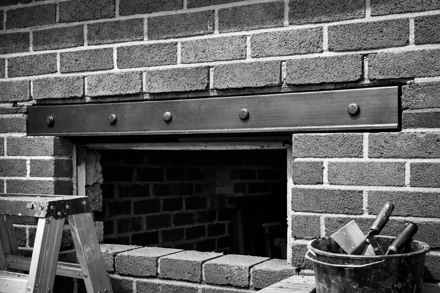 Top rated brick repair Dallas showing a new steel lintel installation for structural wall support.